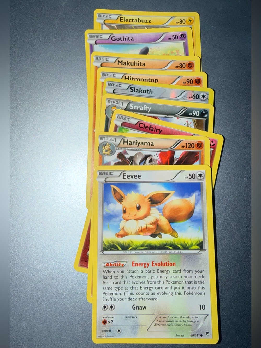 Pokemon Eevee and assorted Pokemon cards